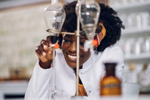 istock A cheerful african american female apothecary technician is working on a cure. 1676720329