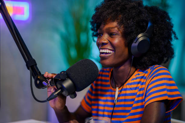 istock Interracial podcaster is sitting in a home broadcasting studio 1676720864