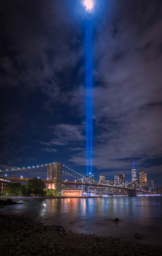 The Tribute in Light 9/11 memorial shot from Brooklyn Bridge Park. New York City