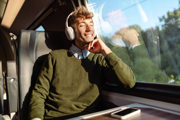 istock A young commuter enjoying his train ride 1676730902