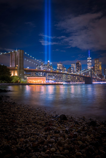 The Tribute in Light 9/11 memorial shot from Brooklyn Bridge Park. New York City