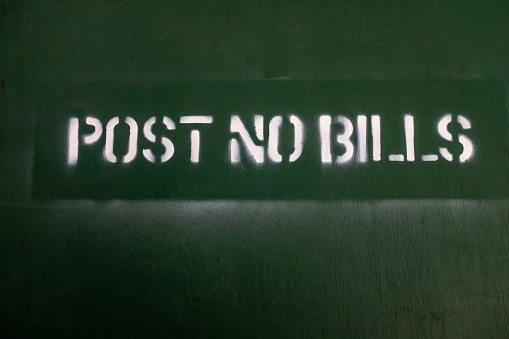 A view of a post no bills sign