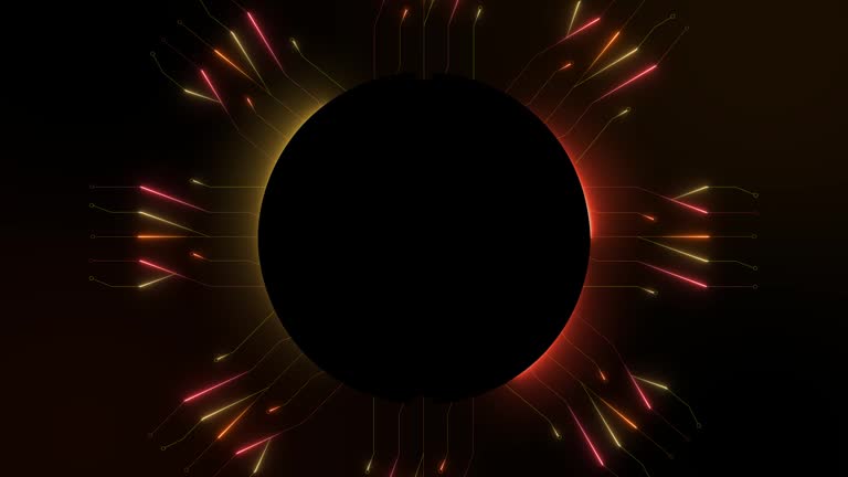 A black microchip. Lines of light. Electronics. Orange color. Round shape.