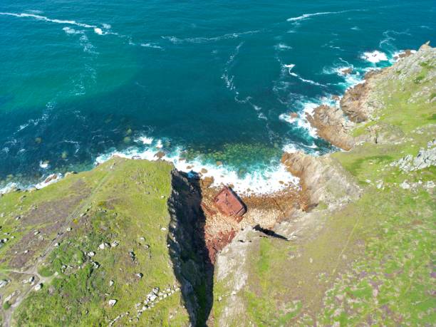 Sea mist or fog over the cliffs of Lundy Island off the coast of Devon