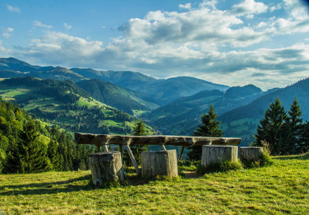 istock wooden table in the mountains 1676763725