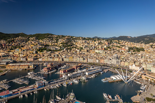 The drone aerial view of old port and downtown district of Genoa, Italy.