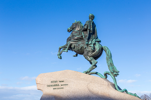 Equestrian, bronze monument to the Russian Emperor Peter the Great against the sky, known as the Bronze Horseman in St. Petersburg, Russia (1782)