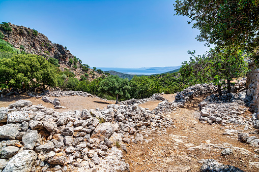 Ruins of the ancient Greek city of Lato,2500 years old near Kritsa, Crete. Lato was one of Crete's most important Dorian city-states, considered the most well-preserved city of the classical Hellenistic period. Built between two hills, in a strategic location, offers defensive coverage to the entire city.