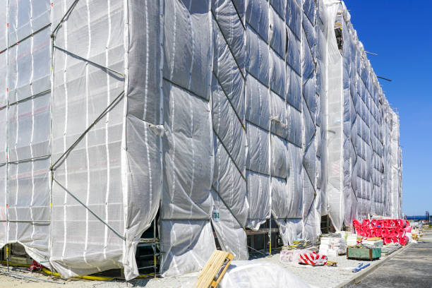 istock With white safety net covered multistorey residential building facade during renovation works 1676806403