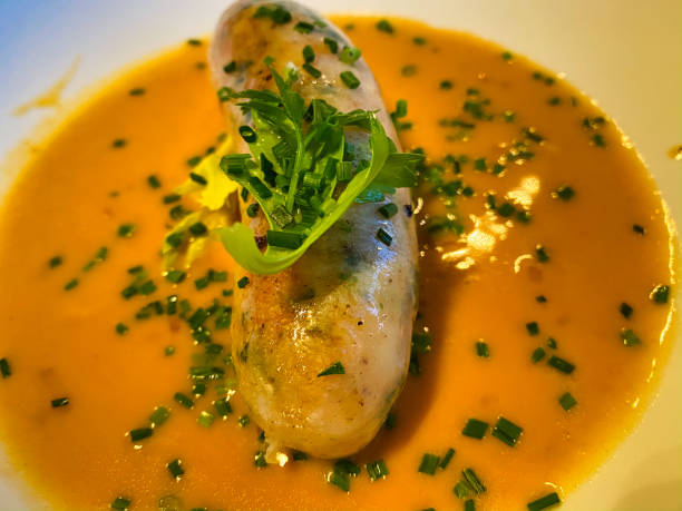 istock Seafood sausage with sauce on the plate 1676838591