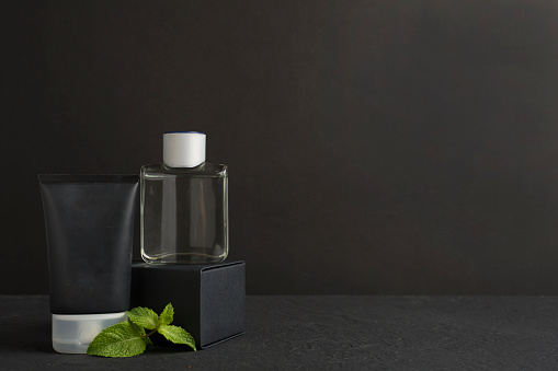 perfume bottle on a black background