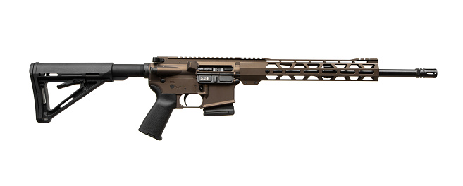 Modern automatic rifle in bronze color. Weapons for police, special forces and the army. Automatic carbine. Assault rifle on white back.