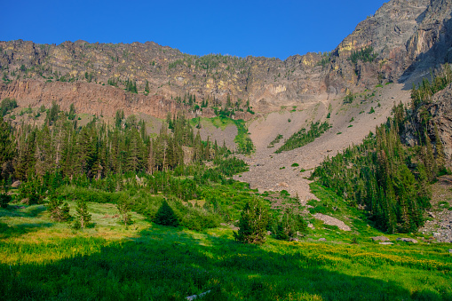 Large cliffs and rockfall above Little Strawberry Lake in the the Strawberry Mountain Wilderness of Central Oregon.