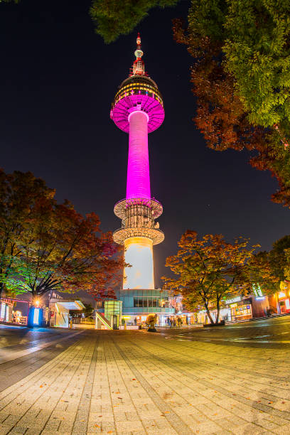 istock Beautiful pink pavilion, trees and towers 1676928611
