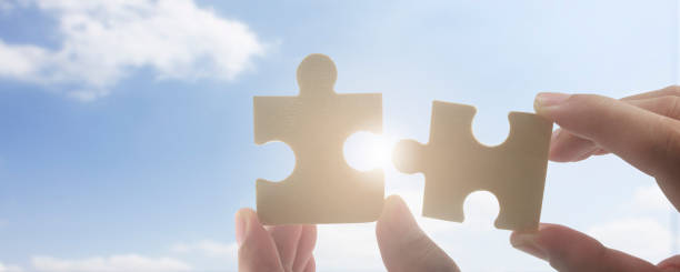 istock Connecting jigsaw puzzle. Business solutions success 1676957958
