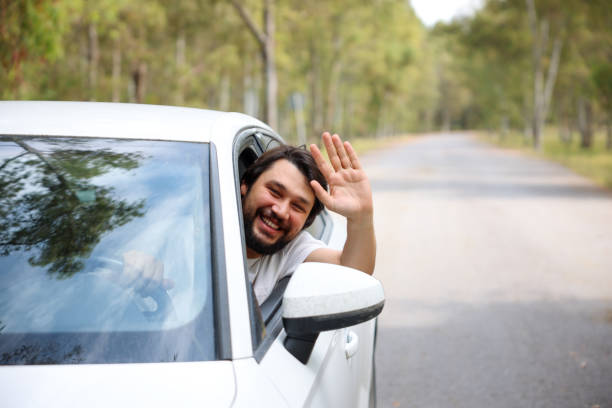 istock Driver man is driving and enjoy travel 1676992621