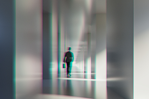 Abstract image of businessman walking down the corridor, 3D generated image.