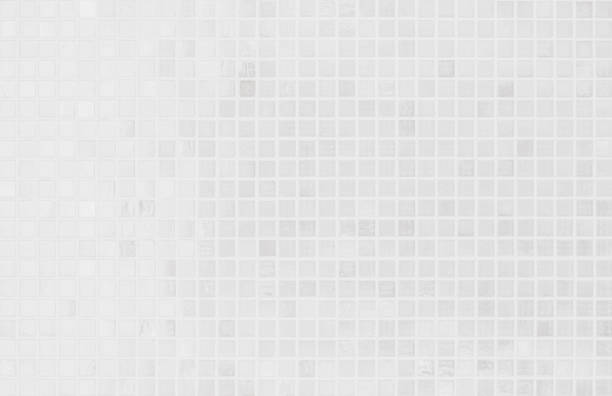 istock White tile wall chequered background bathroom texture. Ceramic brick wall and floor tiles mosaic background in bathroom and kitchen clean. Design pattern geometric with grid wallpaper decoration. 1677021963