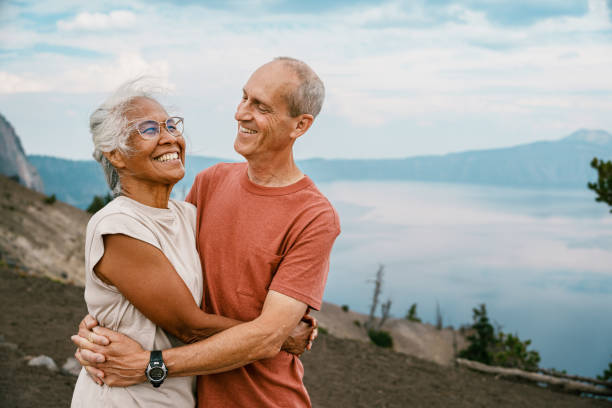 istock Happy retired couple enjoying nature 1677022588