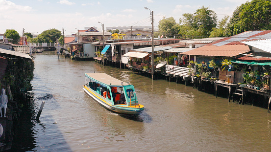 Boat Tour - Baan Silapin - Bangkok River Markets - Boat Passing by the River Markets in Thailand