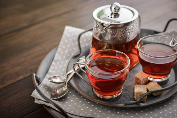 istock Two glass cup of tea with teapot 1677108640