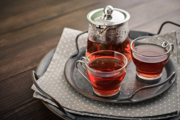 istock Two glass cup of tea with teapot 1677109157