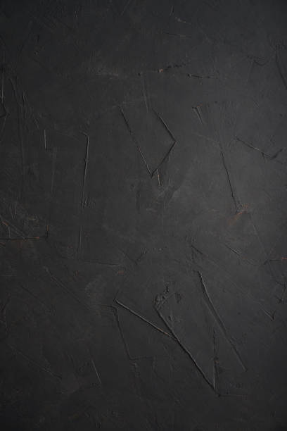 istock Texture of old black concrete wall 1677113963