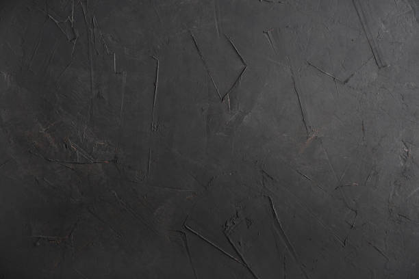 istock Texture of old black concrete wall 1677113964
