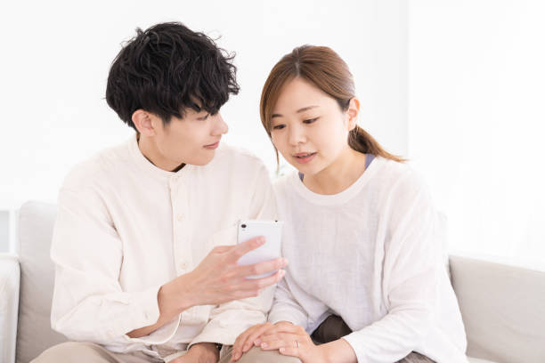 istock couple at modern home , smart phone 1677134594