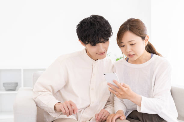istock couple at modern home , smart phone 1677134636
