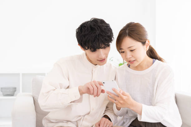 istock couple at modern home , smart phone 1677135182