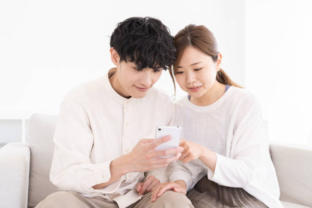 istock couple at modern home , smart phone 1677136066