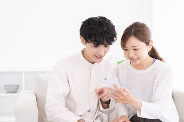 istock couple at modern home , smart phone 1677136279