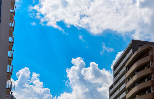 Free Stock Photo of Tall apartment building under a beautiful blue sky ...