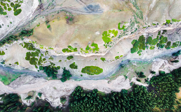 istock A car drives along a road in a valley 1677182220