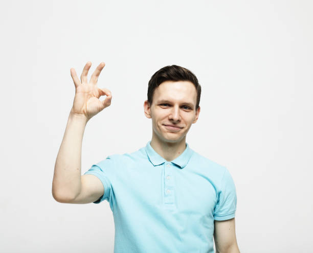 istock young man showing ok over white background 1677188483
