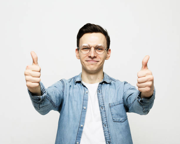 istock young man showing ok over white background 1677188488