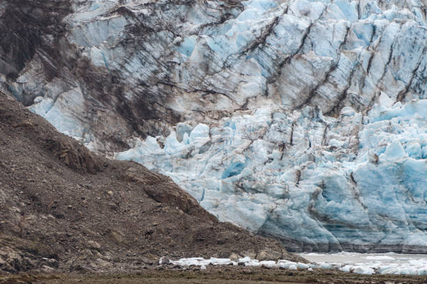 istock Melting iceberg full of blue and white ice 1677189645