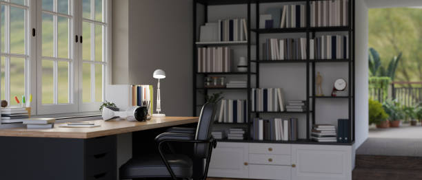 istock Interior design of a modern home office workspace or study table with a desk with accessories. 1677210307
