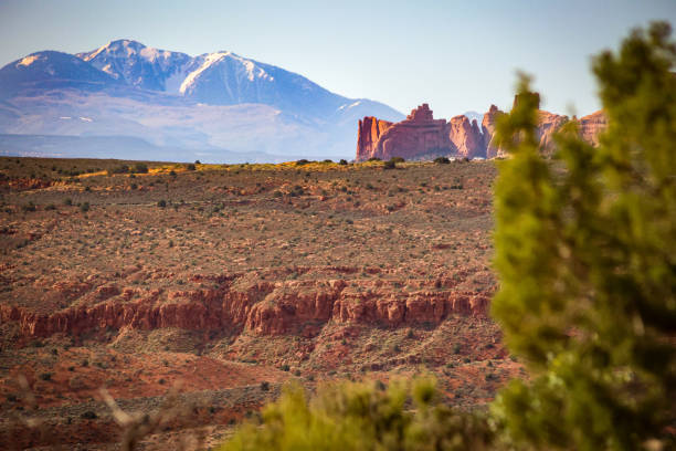 istock Arches national park in Utah and snow capped mountains 1677223556