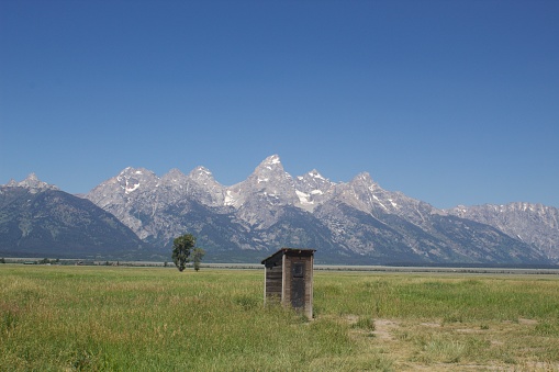 Grand Tetons remote outhouse on Mormon row