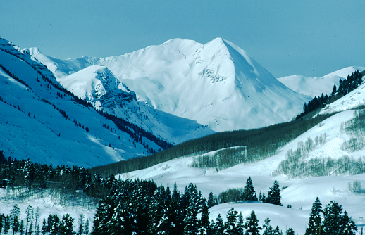 Founded in 1878, Crested Butte is a former coal-mining town turned ski resort nestled in the Elk Mountains of northern Gunnison County. The town lies about twenty-eight miles north of the county seat of Gunnison and about the same distance south of Aspen.