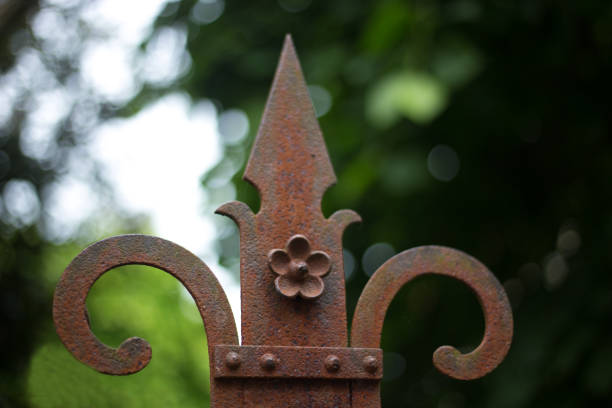 Crémieu, France: Rusty Floral Detail on Old Metal Gate