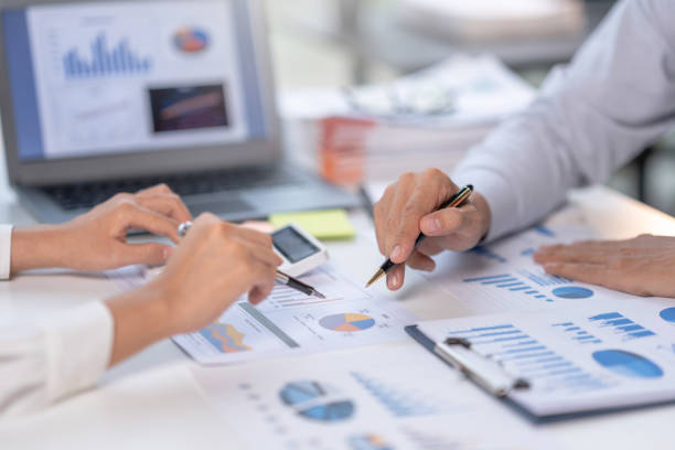 istock Close-up view of businessman analyzing graphs and organization chart  explain to the meeting the future business trends in the organization. 1677312665