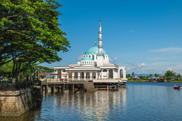 waterfront of Sarawak river in Kuching Masjid India, Floating Mosque located in Kuching city, Sarawak, East Malaysia kuching waterfront stock pictures, royalty-free photos & images