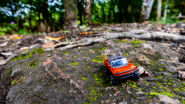 istock Minahasa, Indonesia : December 2022, the toy car in nature 1677373030