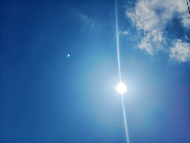 istock clear sky.The sun shines at noon. 1677379364