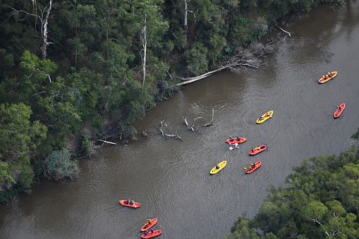 Discovering serene natural beauty from an aerial perspective during kayaking adventure.