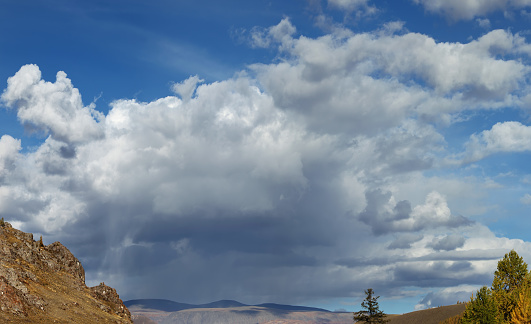 Blue sky with white clouds, natural backgrounds, sunny autumn day