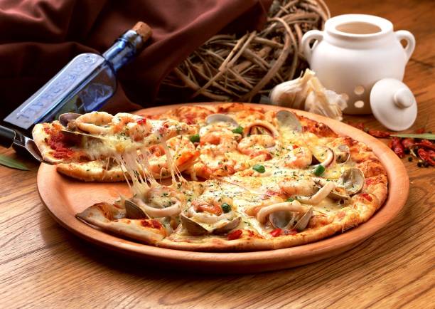 A plate filled with pizza on a wooden table